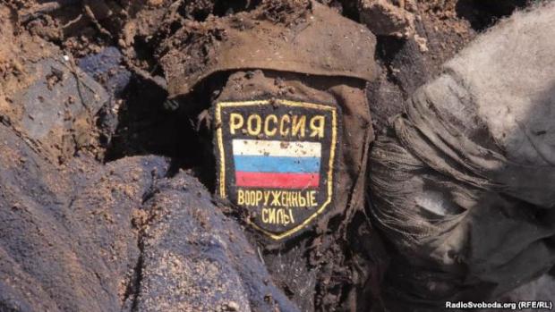 Останки одного з двох військових, знайдених місією «Евакуація 200» поблизу селища Кримського у Луганській області. 10 червня 2016 року